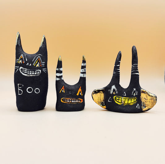Grinny Black Cat