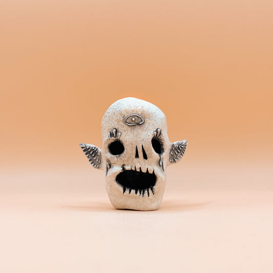 Flying & Shocked Skull